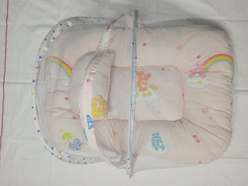Baby crib with colorful bedding featuring cartoon characters on a white background